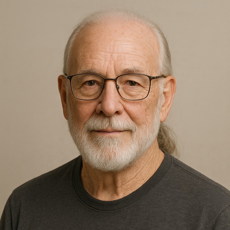 Richard Spanier with glasses and a white beard.